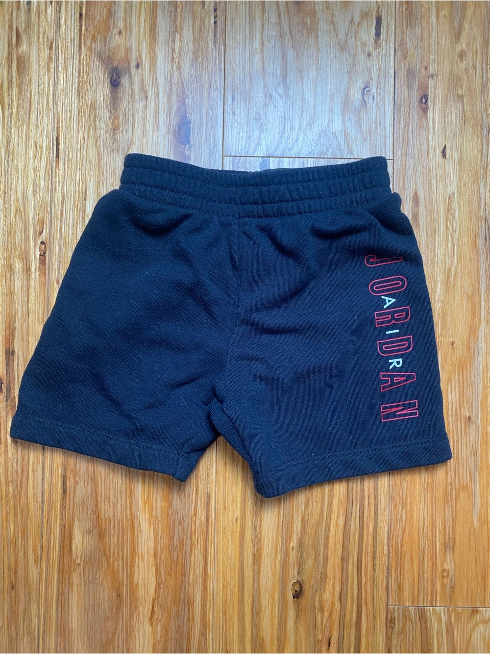 Jordan Black Athletic Shorts with Red Logo